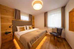 Postel nebo postele na pokoji v ubytování FESH LIVING
