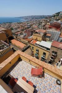 vista sulla città dalla parte superiore di un edificio di Chiaia Stunning SeaView StudioFlat with 2 Terraces By HouseinNaples a Napoli