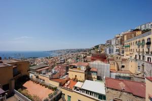 una vista aerea di una città con edifici di Chiaia Stunning SeaView StudioFlat with 2 Terraces By HouseinNaples a Napoli