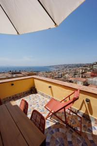 Balcone o terrazza di Chiaia Stunning SeaView StudioFlat with 2 Terraces By HouseinNaples