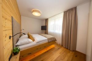 Postel nebo postele na pokoji v ubytování FESH LIVING