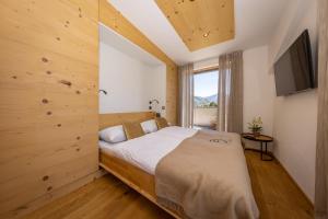 Postel nebo postele na pokoji v ubytování FESH LIVING