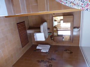 a bathroom with a sink and a mirror at Cuscino e Caffé in Rescaldina