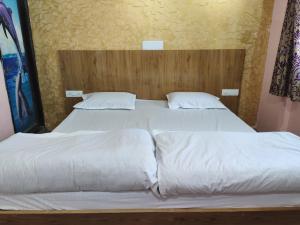 Кровать или кровати в номере Choudhary Guest House