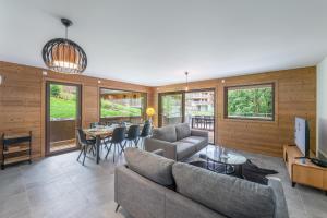 Televízia a/alebo spoločenská miestnosť v ubytovaní Quintessence- Apt B101- BO Immobilier - Châtel - Multipass 2025 offert