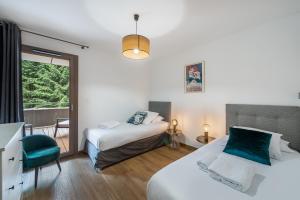 Posteľ alebo postele v izbe v ubytovaní Quintessence- Apt B101- BO Immobilier - Châtel - Multipass 2025 offert + 8 fotografií