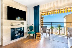Televízia a/alebo spoločenská miestnosť v ubytovaní WintowinRentals Increible Apartamento & Mejor ubicación