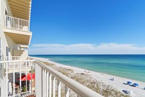 a balcony with a view of the beach at Sans Souci 407 in Pensacola Beach