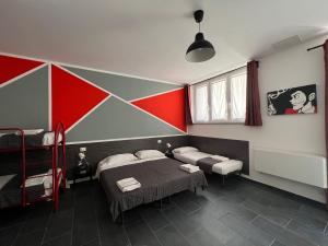 Postel nebo postele na pokoji v ubytování Hostel Turin Metro Young