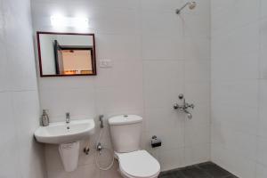 Koupelna v ubytování Corner Stay Serviced Apartment-Racecourse + 8 fotografií