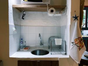 Køkken eller tekøkken på Apartamento Color Centro Histórico - Vila Ilhabela + 39 billeder