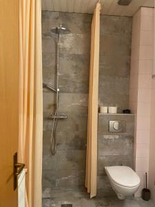 Vannituba majutusasutuses Corso Apartment