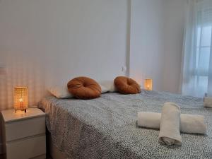 Łóżko lub łóżka w pokoju w obiekcie C01A01 Apartamento Moderno con vistas al mar