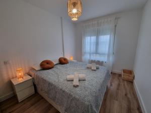 Łóżko lub łóżka w pokoju w obiekcie C01A01 Apartamento Moderno con vistas al mar
