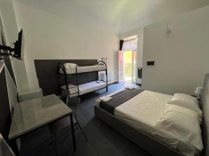 Postel nebo postele na pokoji v ubytování Hostel Turin Metro Young