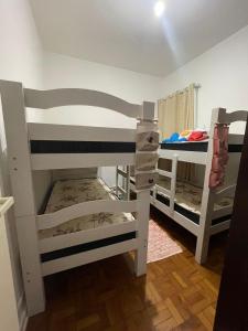 Ένα ή περισσότερα κρεβάτια σε δωμάτιο στο Hostel Convention Expo SP