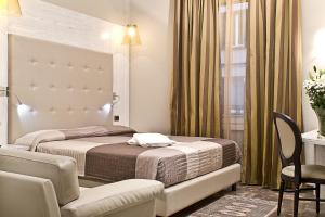 Postel nebo postele na pokoji v ubytování Hotel Moderno