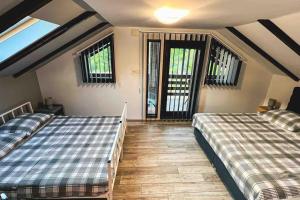 Postel nebo postele na pokoji v ubytování Holiday Home Cindric Gaj + 29 fotografií