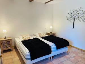 Posteľ alebo postele v izbe v ubytovaní Le Chalet de Bémont