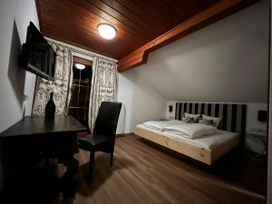 Postel nebo postele na pokoji v ubytování Pension Steinkogel