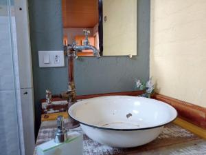 Ein Badezimmer in der Unterkunft Casa em Campos do Jordão