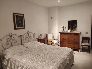 Ένα ή περισσότερα κρεβάτια σε δωμάτιο στο Casa Jacopo deliziosa villa con giardino