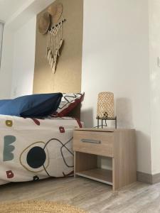 Postel nebo postele na pokoji v ubytování Le Gaudissart 1