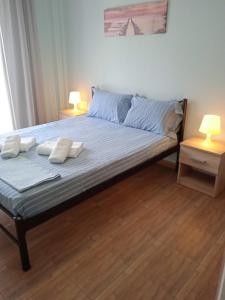 Posteľ alebo postele v izbe v ubytovaní Marina's Apartments - Ciel Apartment