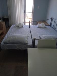 Posteľ alebo postele v izbe v ubytovaní Marina's Apartments - Ciel Apartment