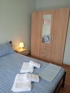 Posteľ alebo postele v izbe v ubytovaní Marina's Apartments - Ciel Apartment