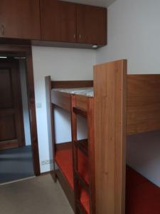 Palanda nebo palandy na pokoji v ubytování Byt 4+kk v klidné části obce Bedřichov