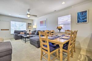a dining room and living room with a table and chairs at Peaceful Petaluma Getaway with Deck and Grill! in Petaluma