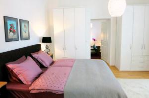 Łóżko lub łóżka w pokoju w obiekcie Apartment Theresiengasse