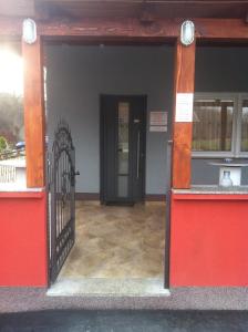 an entrance to a building with a black gate at Lugarnica in Zagreb