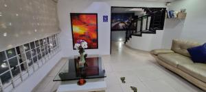 TV a/nebo společenská místnost v ubytování Blue House Corferias