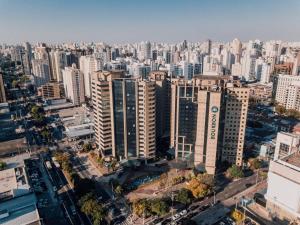 an aerial view of a city with tall buildings at Hotel Bourbon Ibirapuera Suite 5 estrelas Moema in São Paulo