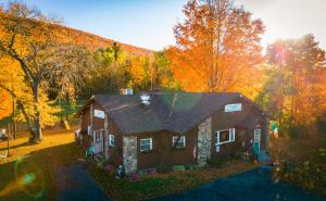 an aerial view of a house in the woods at Jimmy OConnor's Windham Mtn Inn in Windham