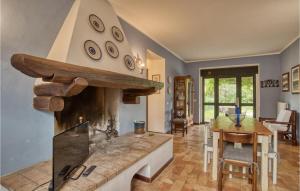 a kitchen with a stove top oven in a room at Alfina 2 in Castel Giorgio