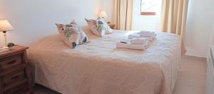 Ένα ή περισσότερα κρεβάτια σε δωμάτιο στο Aparts Complejo Ricanor
