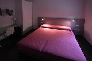 Postel nebo postele na pokoji v ubytování Hotel B&B Francesca