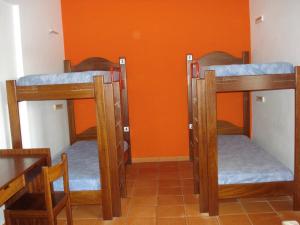 Ein Bett oder Betten in einem Zimmer der Unterkunft HI Almograve – Pousada de Juventude