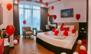 Rúm í herbergi á Golden Line Hotel Danang