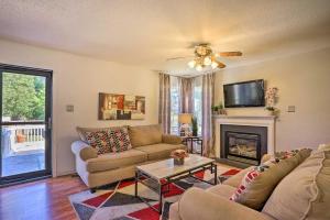 a living room with a couch and a fireplace at 9 Mi to Richmond Sandston Home with Office in Sandston