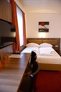 Tempat tidur dalam kamar di ITM Hotel Motel21 Hamburg-Mitte