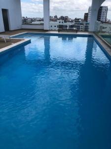 Der Swimmingpool an oder in der Nähe von Brickell Hotel apto g 08 Santo Domingo Bella Vista