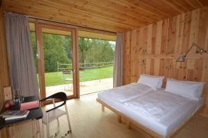 A bed or beds in a room at Casariga