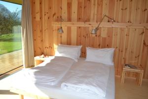 A bed or beds in a room at Casariga