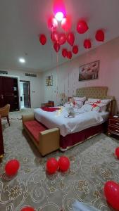 Al Salam Grand Hotel客房内的一张或多张床位