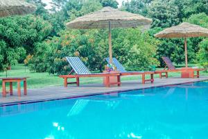 Bazén v ubytování Sigiriya Water Cottage nebo v jeho okolí