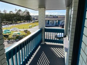 a balcony with a view of a park at Southern Ocean Motor Inn in Port Campbell